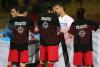 tricourile jucatorilor cu mesajul TRAGETI